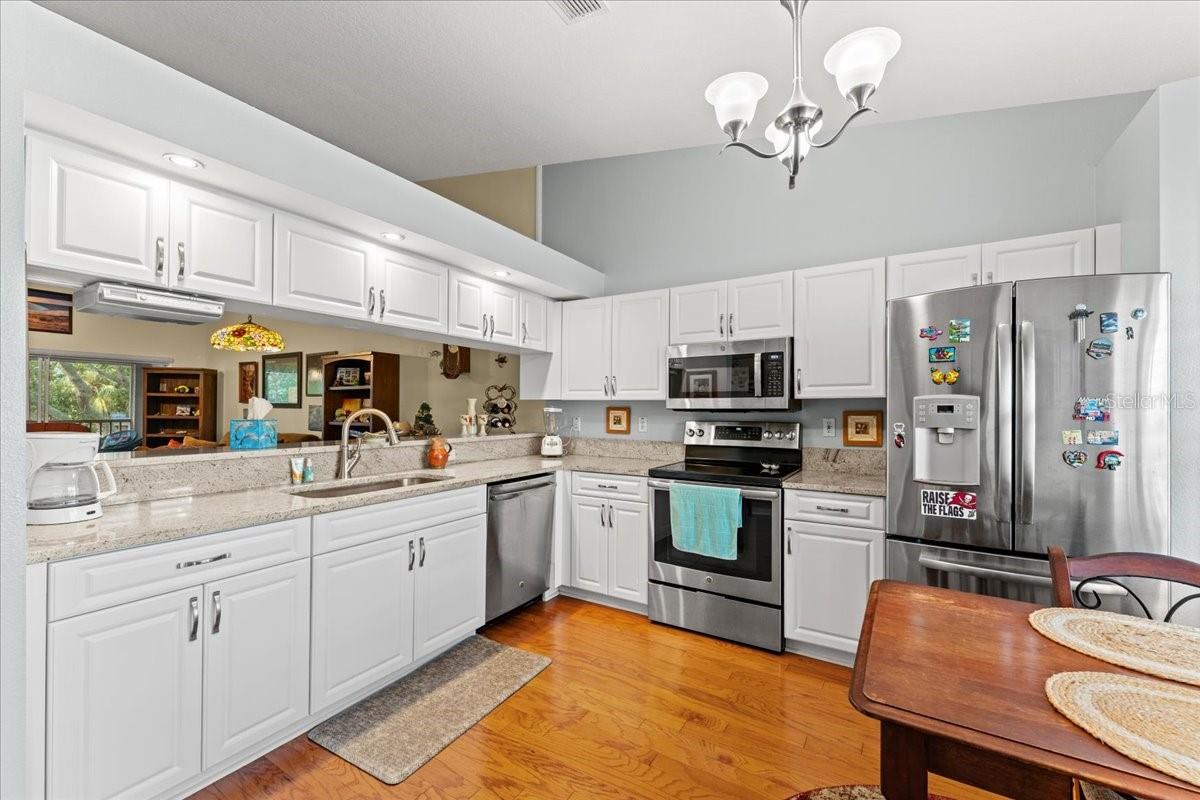 Clean lines, lots of counter space & storage make this kitchen a delight to work in
