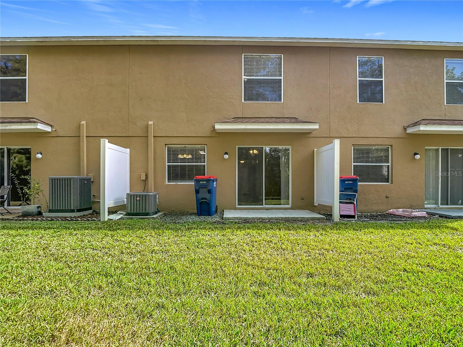 Back of Townhouse and Fenced Patio Area