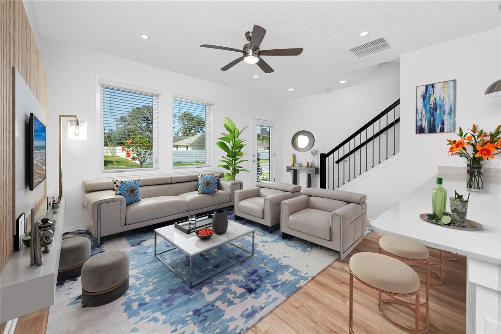 An example of downstairs living area virtually staged