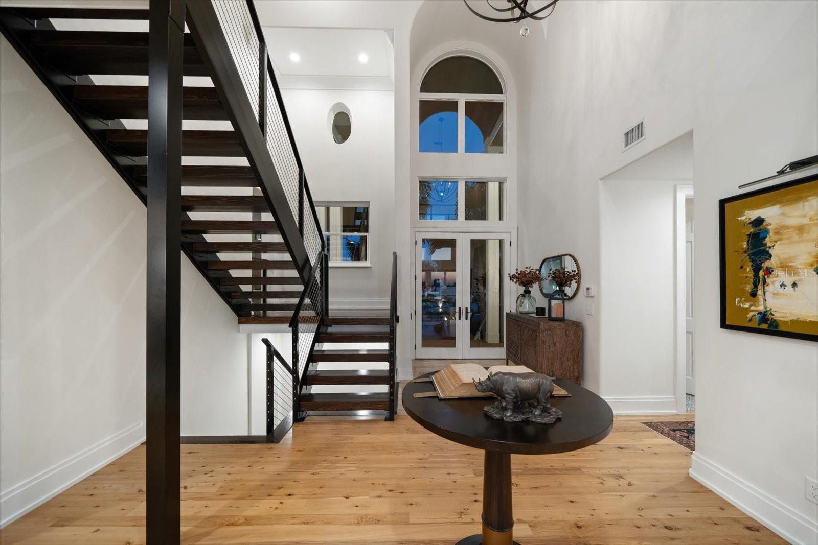 21' barrel ceiling and modern chandelier