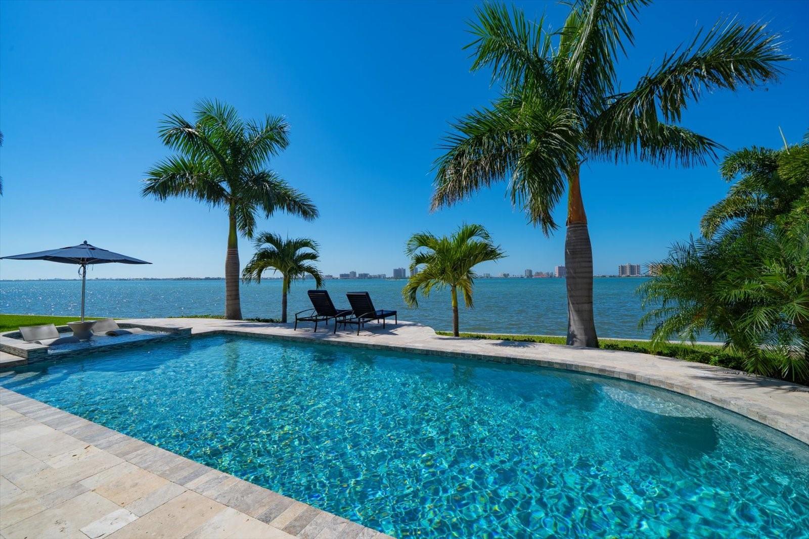 Saltwater pool with travertine deck
