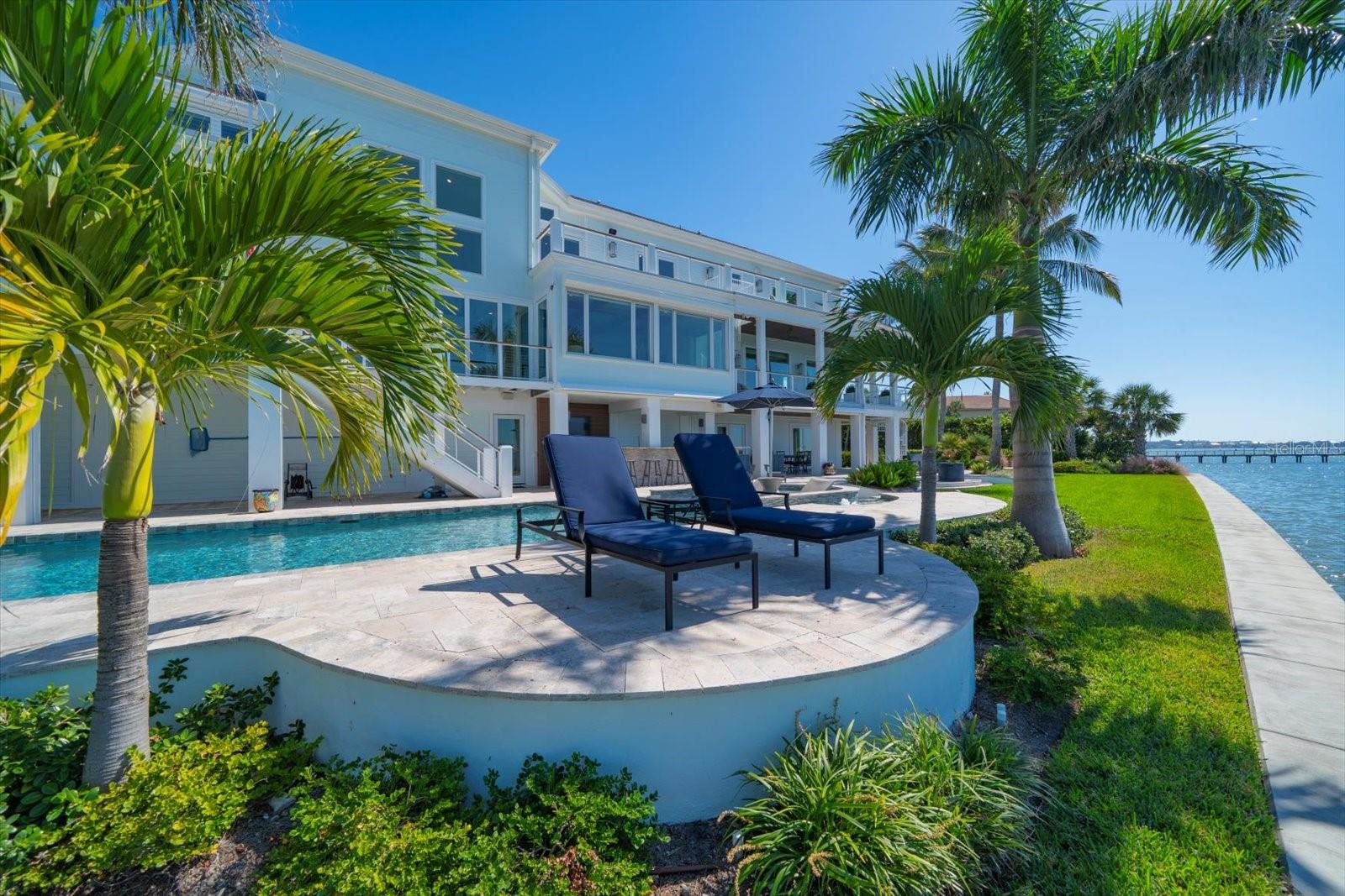 Sunbath while watching the dolphins swim by