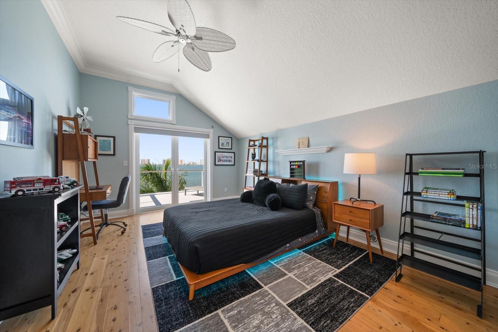 Bedroom 2 with walk in closet and french doors to private balcony