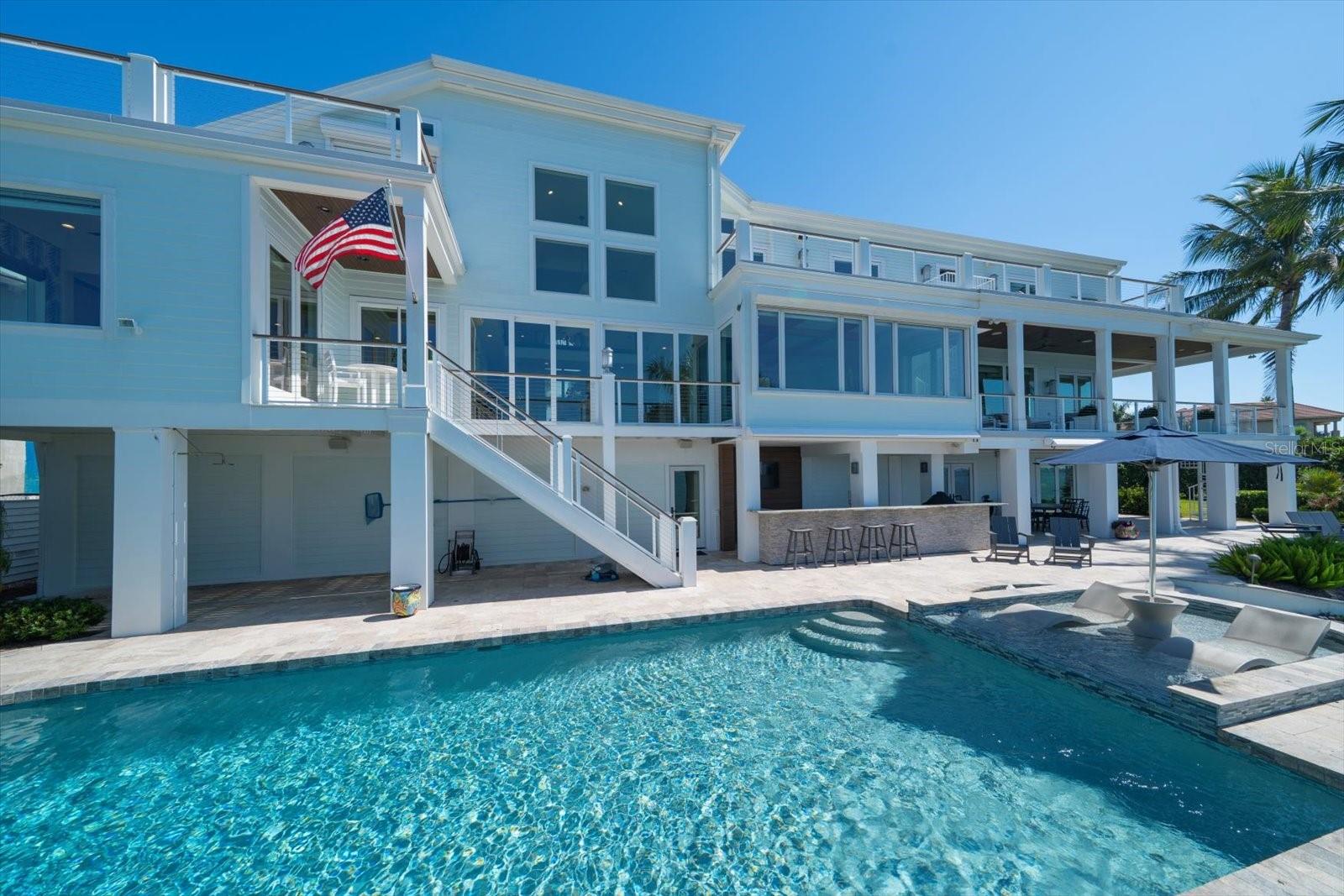 Saltwater pool with travertine deck