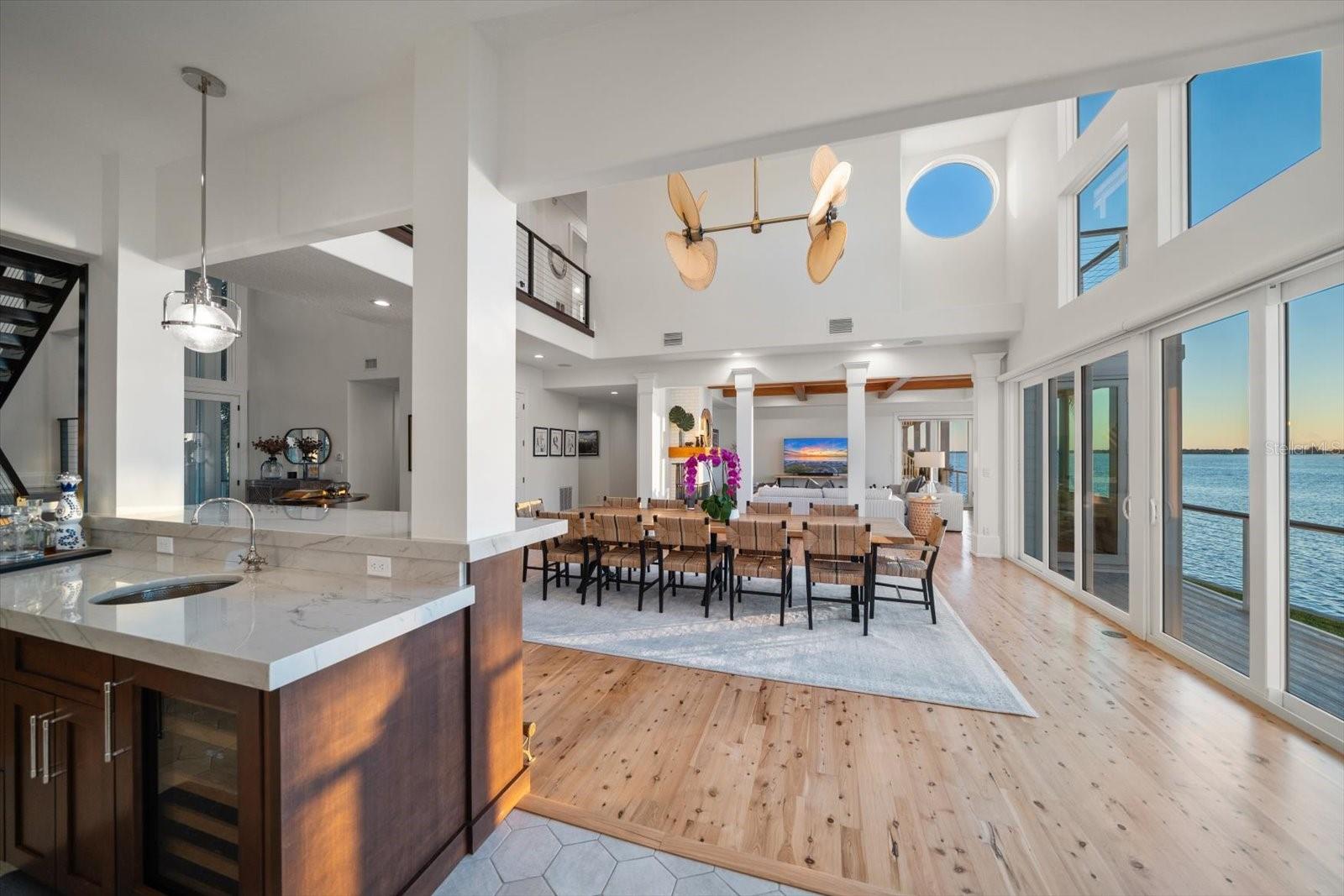 Open dining room with 21' windows