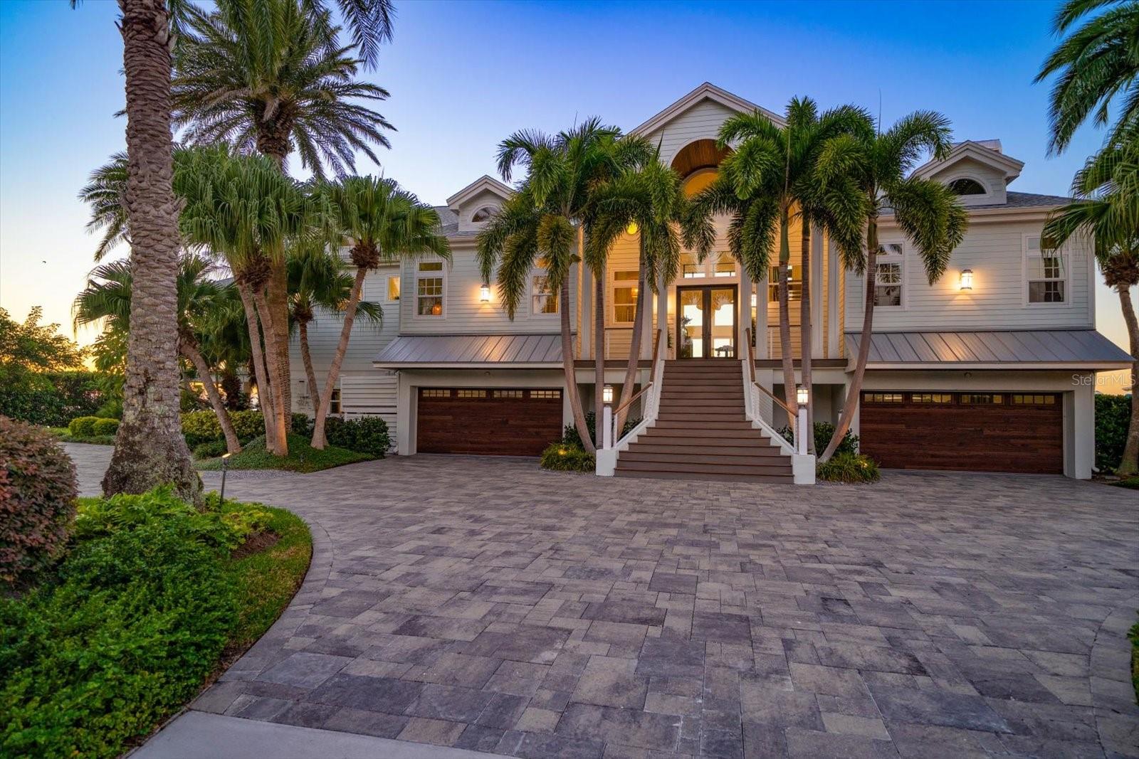 Generously sized spilt garages with room to house 5 cars and toys