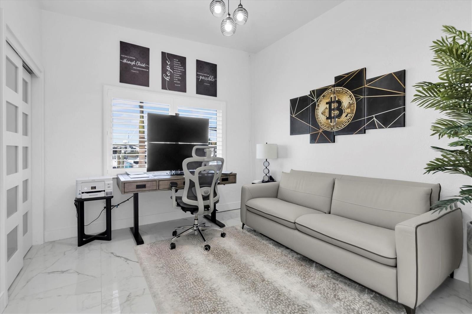 The fourth bedroom features breathtaking water views and adaptable space; perfect as an office, den, library, or playroom.