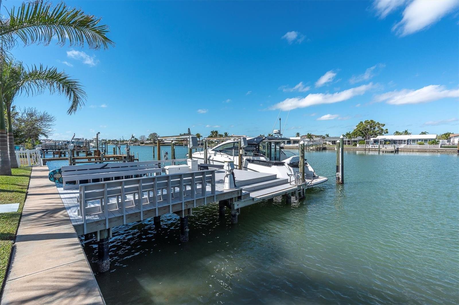 Relax on your private dock,  Watch boats glide by, admire the glorious skies, fish, or enjoy dolphins and manatees playing in nature’s backyard.