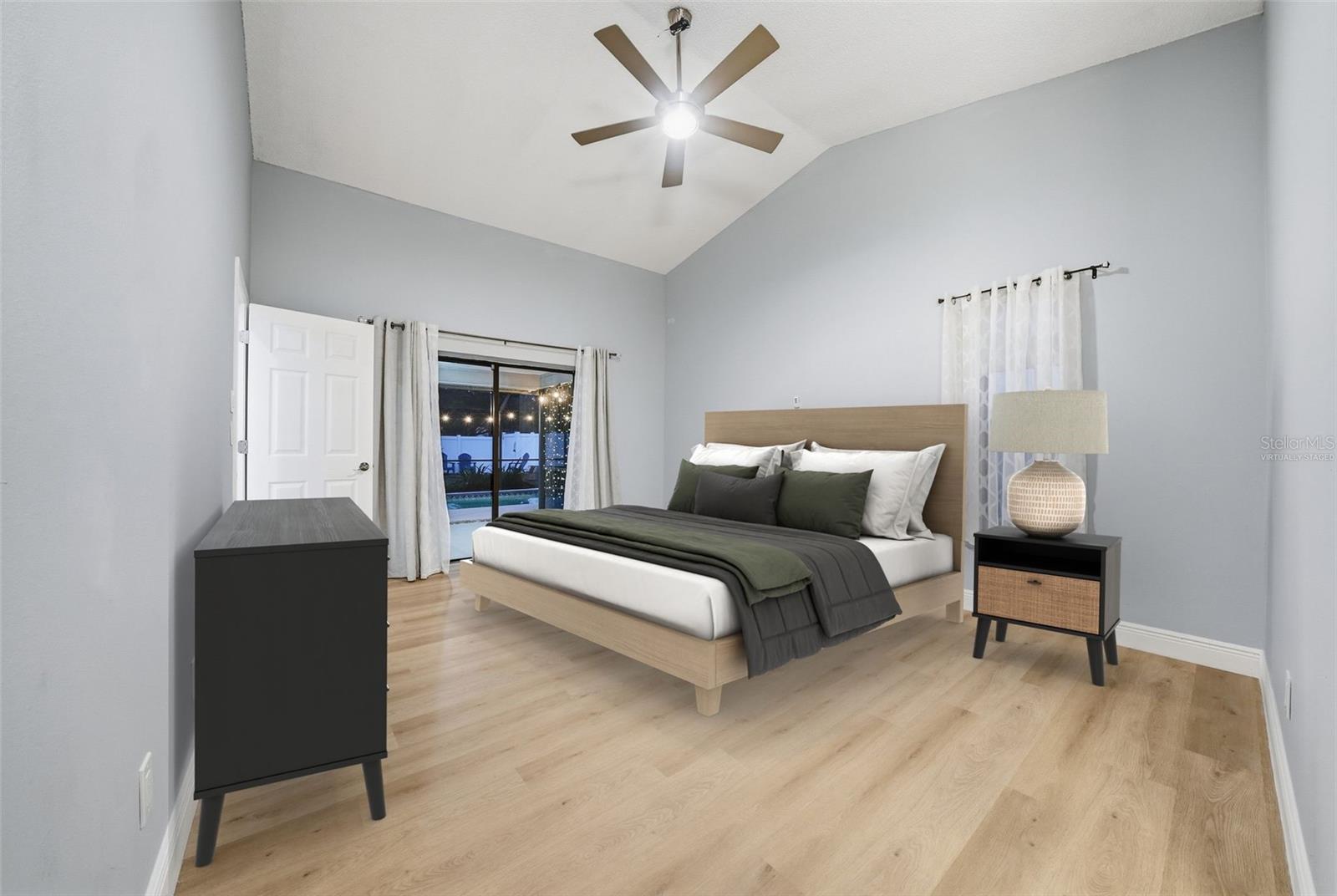 Virtually Staged Primary Bedroom with Pool View