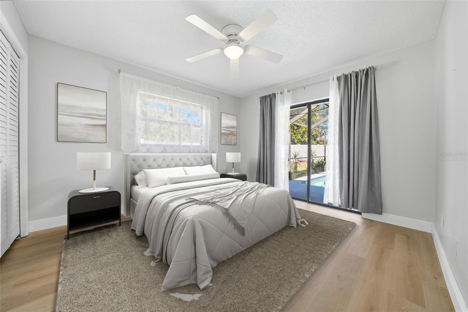 Virtually Staged Bedroom 2 with Pool View