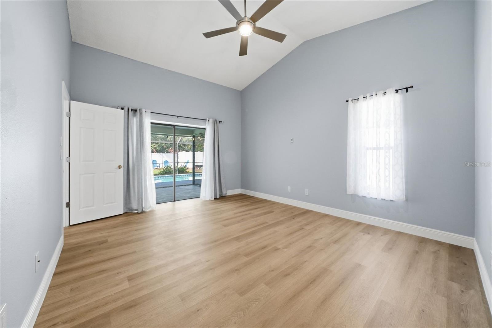 Primary Bedroom with Pool View