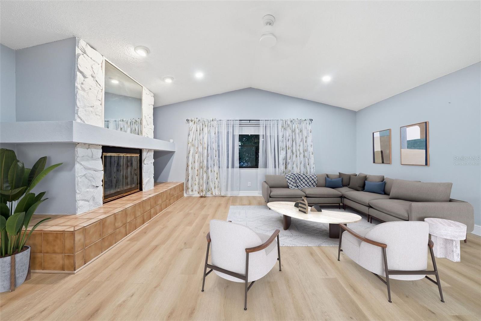 Virtually staged Living Room with Wood-Burning Fireplace