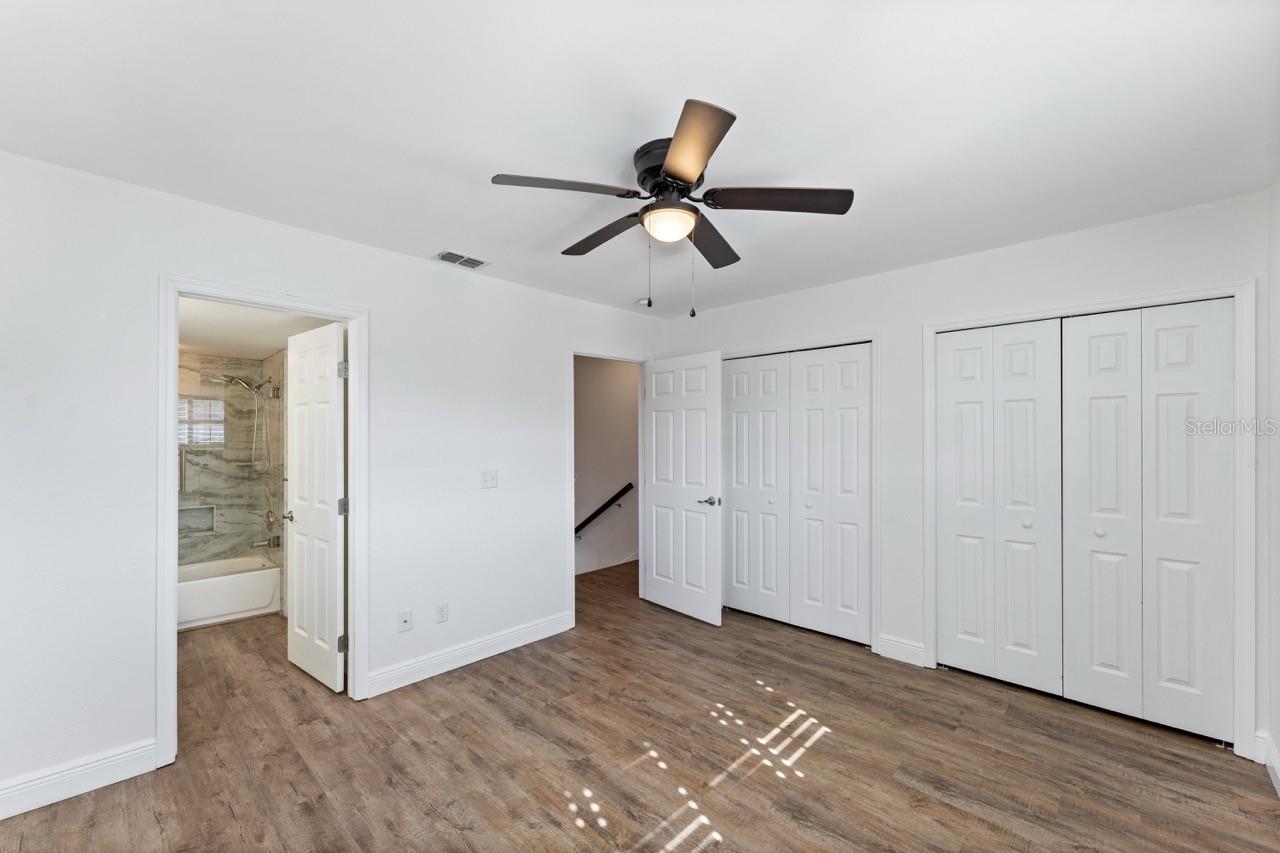 2nd bedroom & en suite bath with tub and shower.