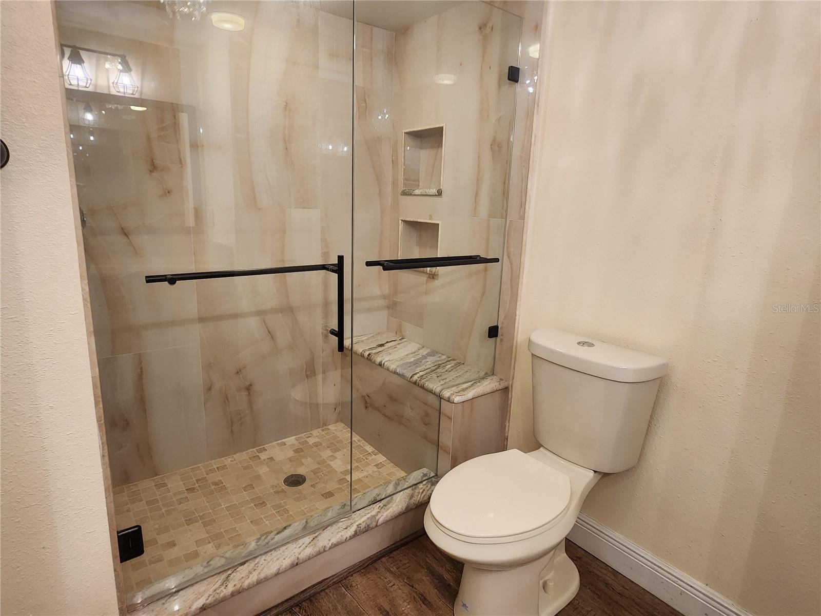 Primary shower with bench seat