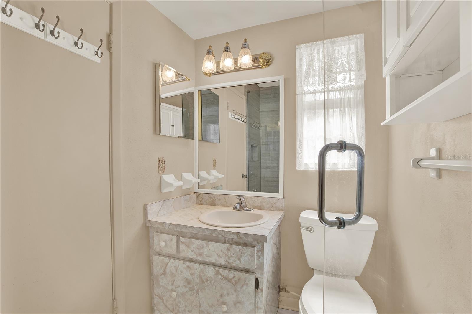 7908 N WOODLYNNE AVE, TAMPA, FL, 33614