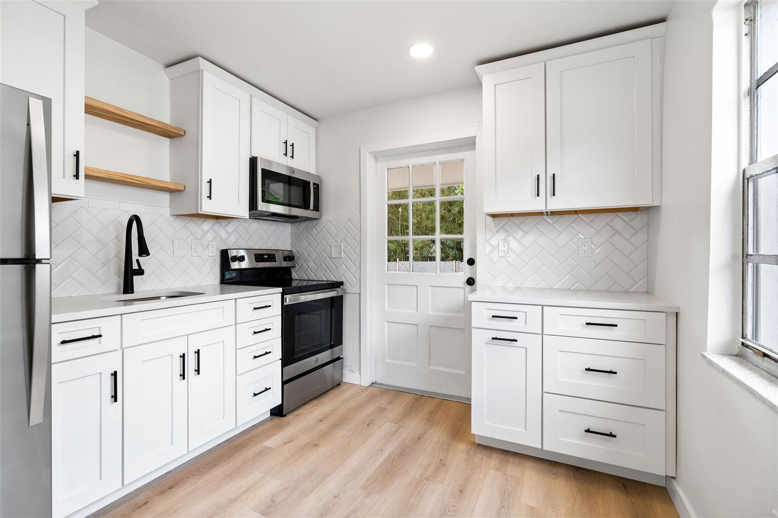 1028 BASS BLVD, DUNEDIN, FL, 34698