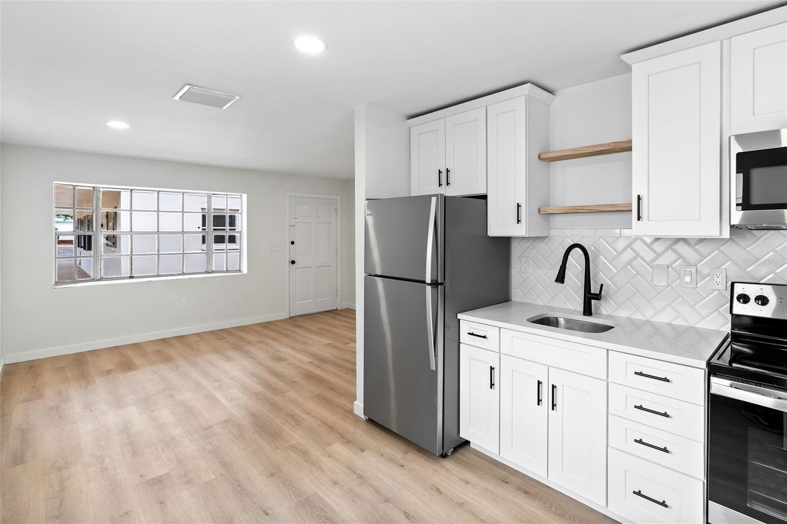 1028 BASS BLVD, DUNEDIN, FL, 34698