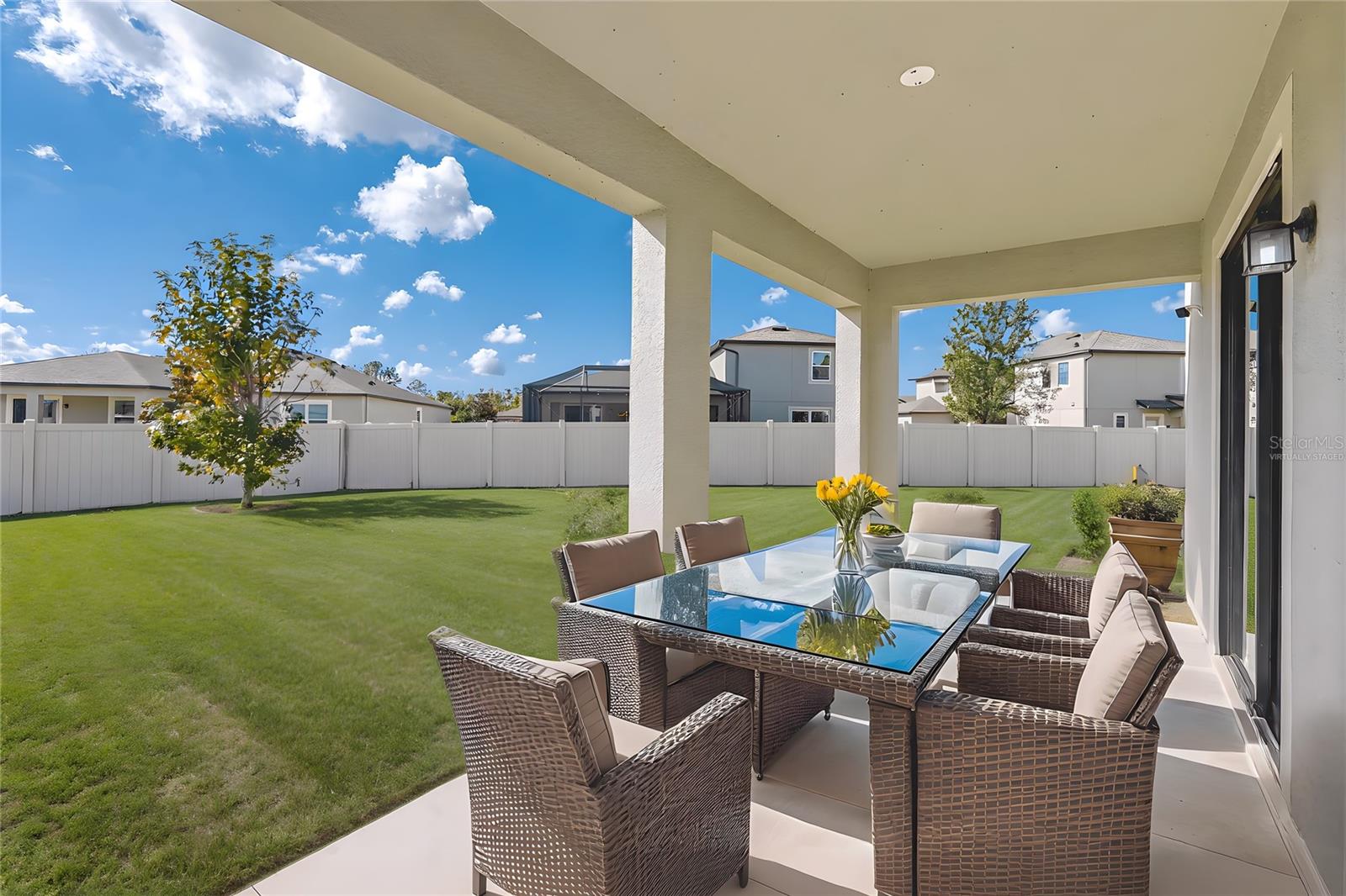 Virtually staged. Relax on the expansive patio!