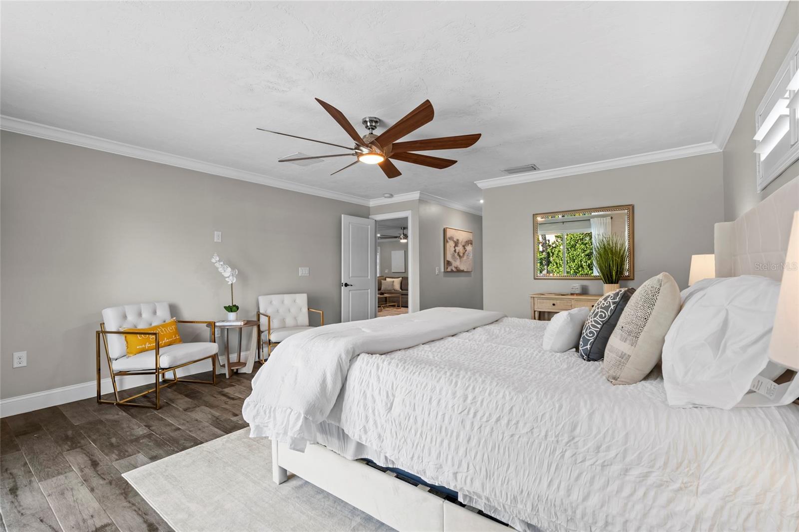 Primary bedroom with King Sized Bed for scale