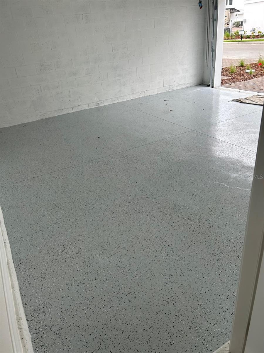 Spacious two-car garage with its own private driveway.