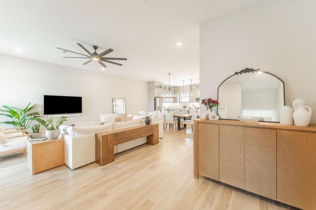 Open-concept living area on the second floor with easy access to the balcony.