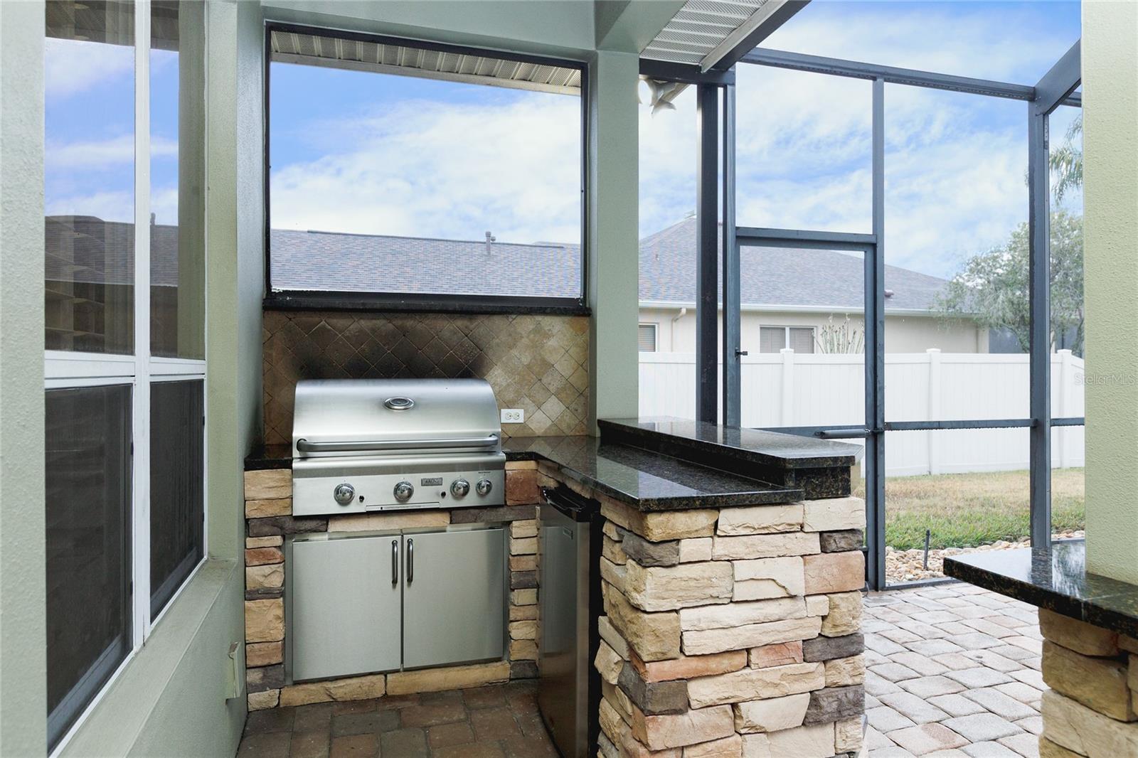 Lanai 1 with built in gas grill and refrigerator