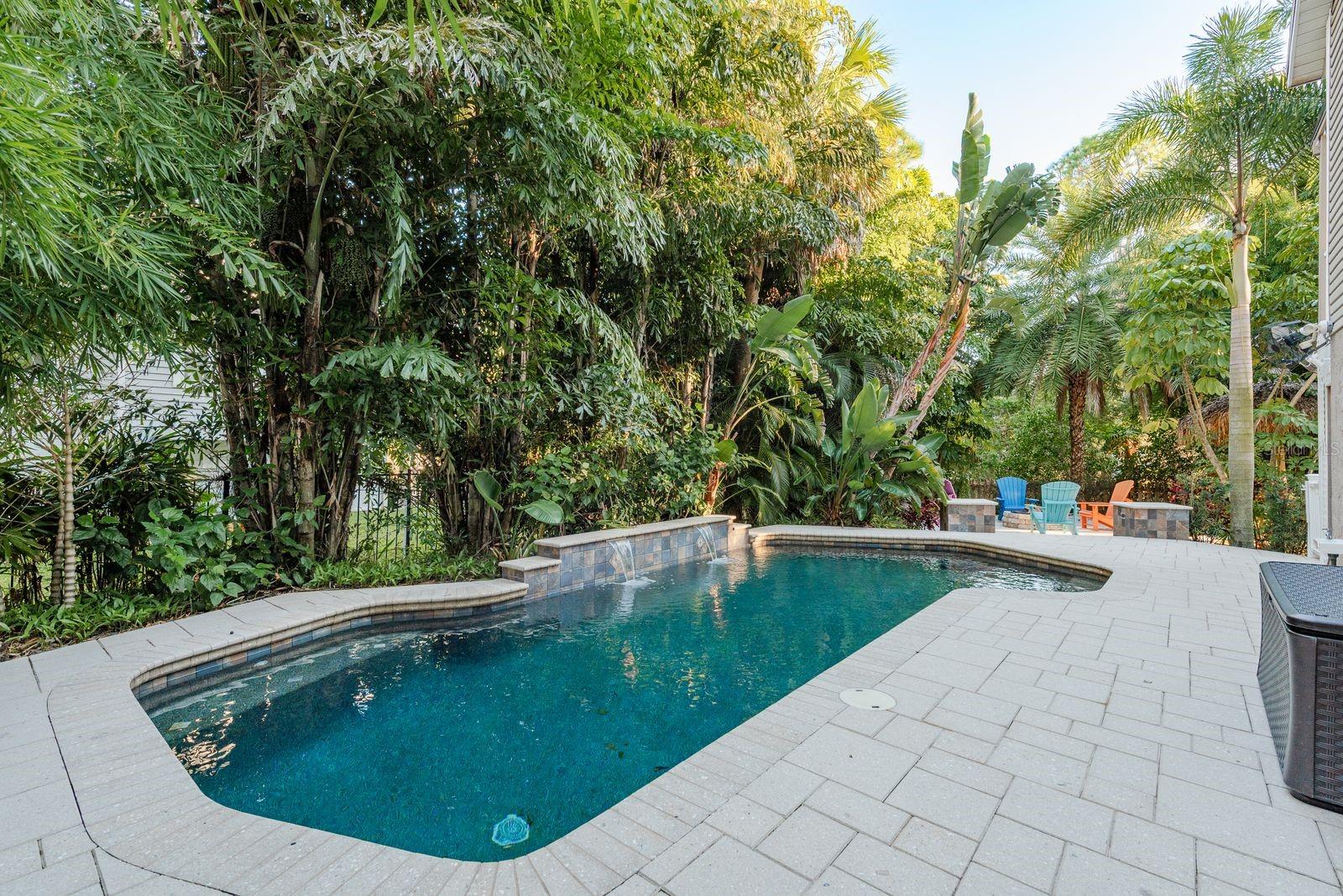 Gorgeous Pool w/ waterfalls and custom shell loc pavers