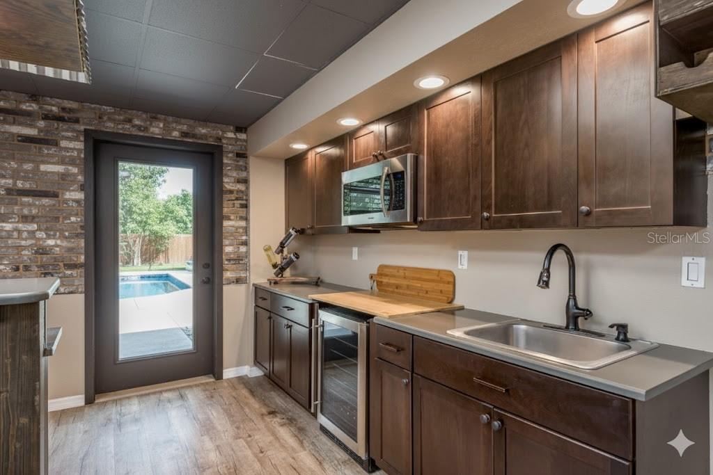 Virtually Added a Door in place of the window to your GORGEOUS POOL!!