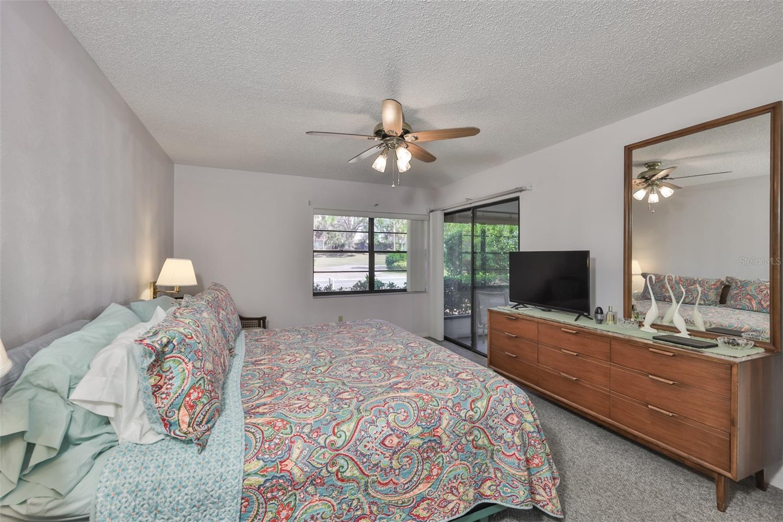 5.2 Primary Suite #2 with carpet and ceiling fan