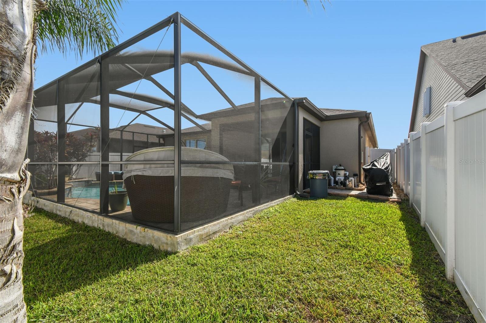 Screened in and fenced in.