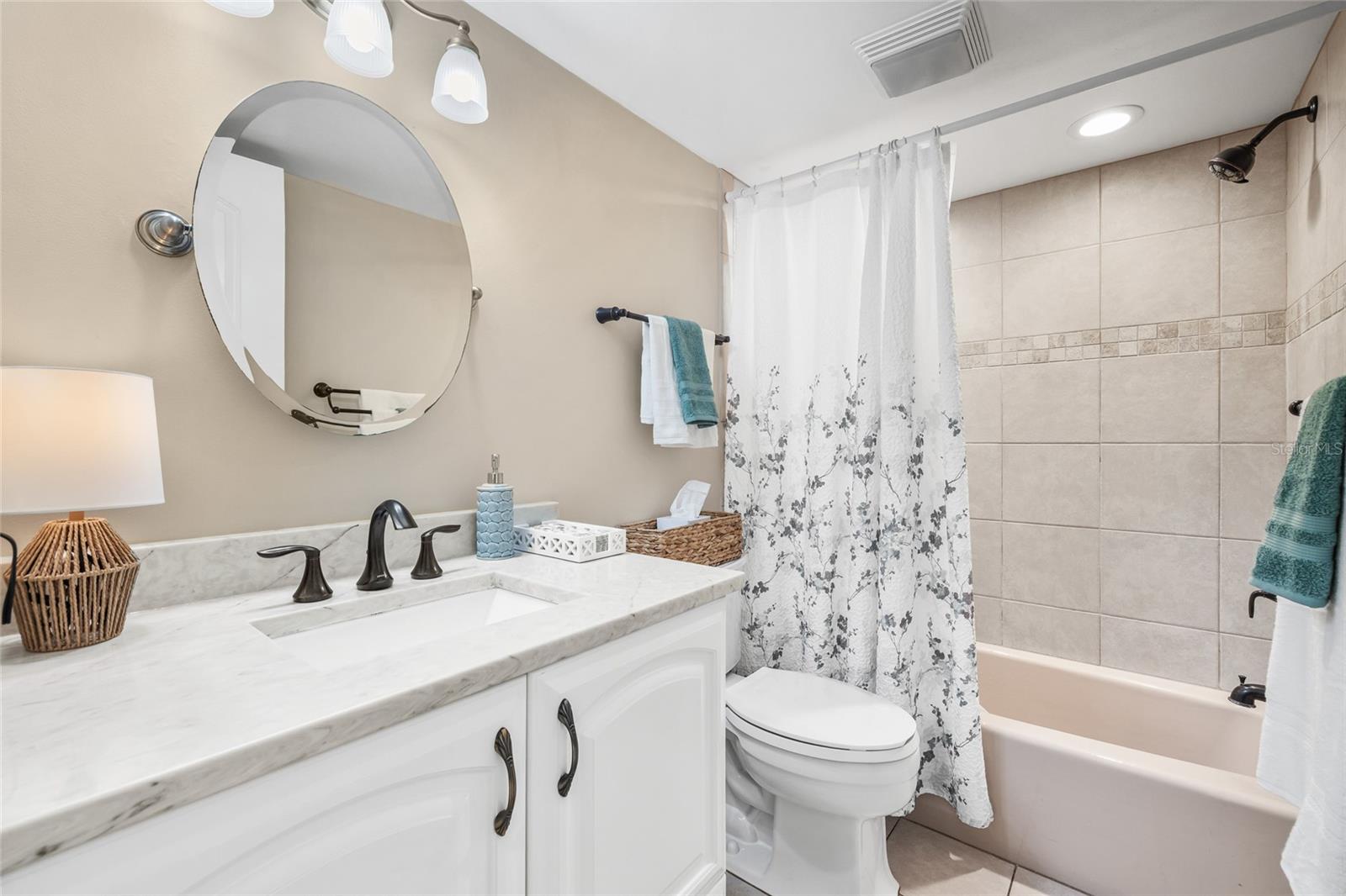 Spacious full bathroom with tub & shower