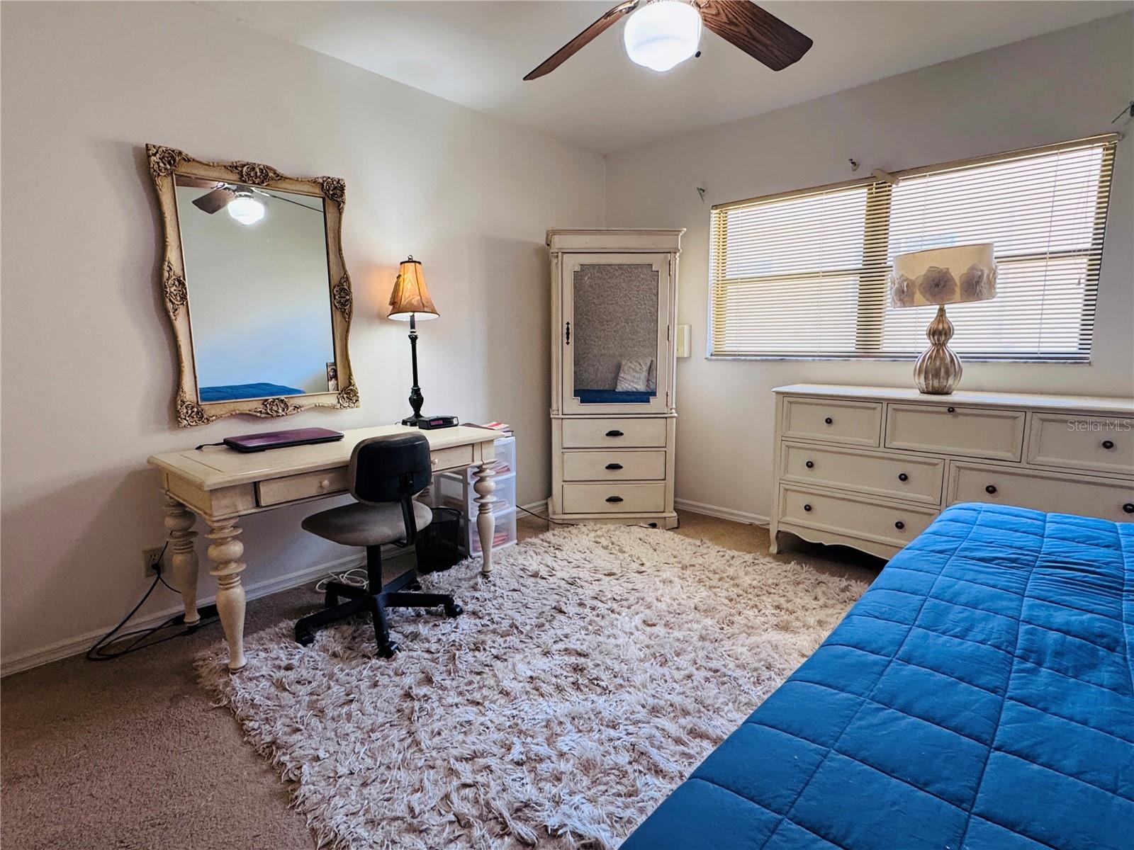 Third Bedroom with carpet flooring.