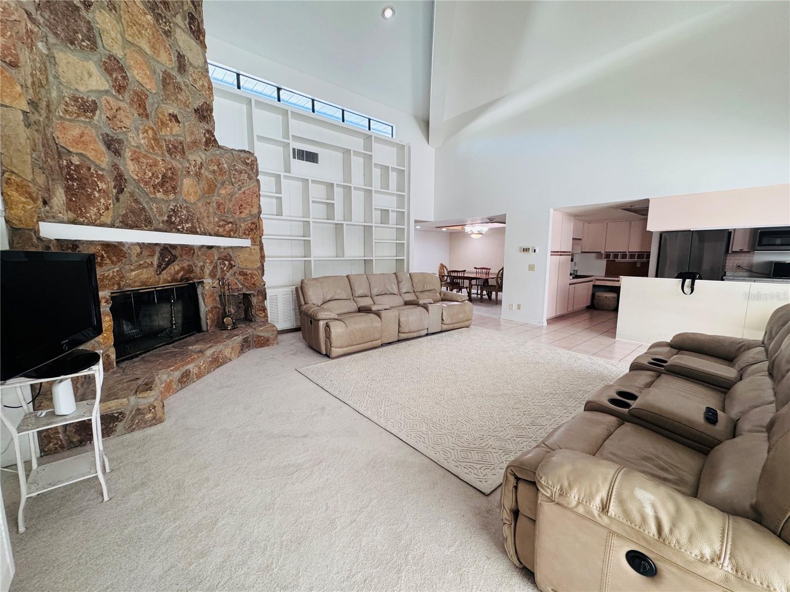 Family Room with Wood Burning fire place.