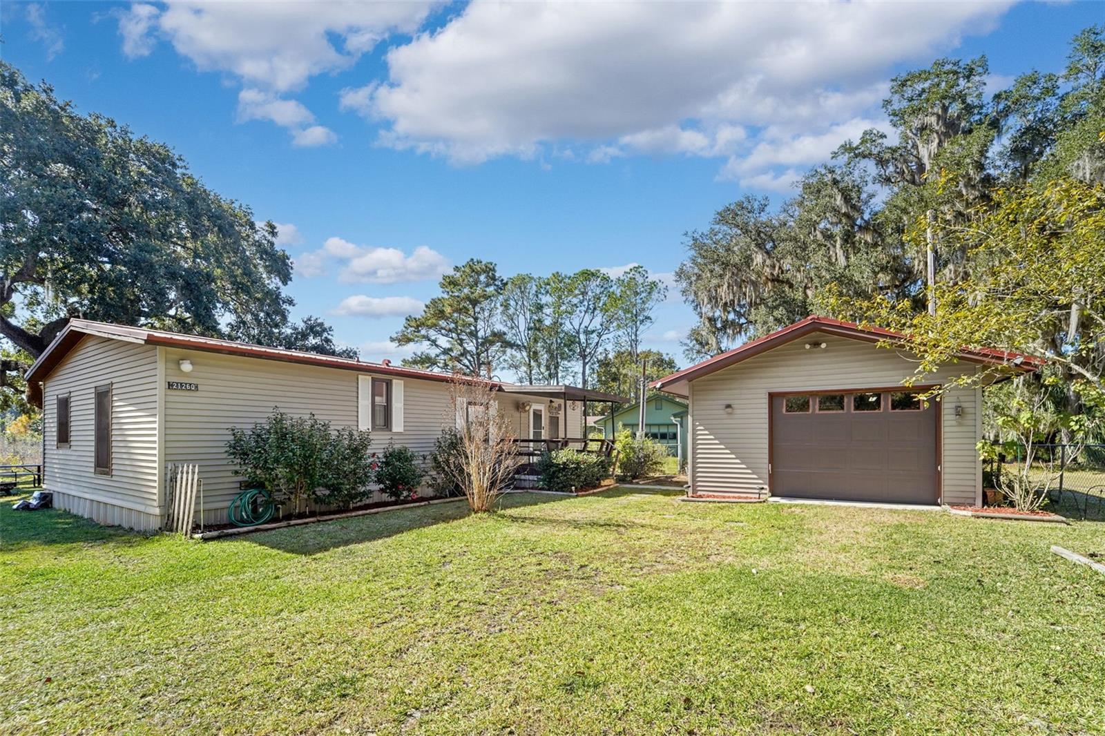 21260 & 21280 NE 146TH PL, FORT MC COY, FL, 32134
