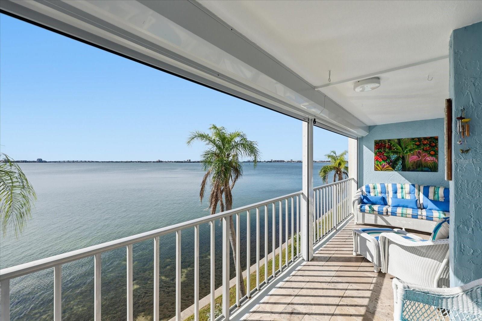 Stunning views and dolphin watching from the expansive double balcony/porch.