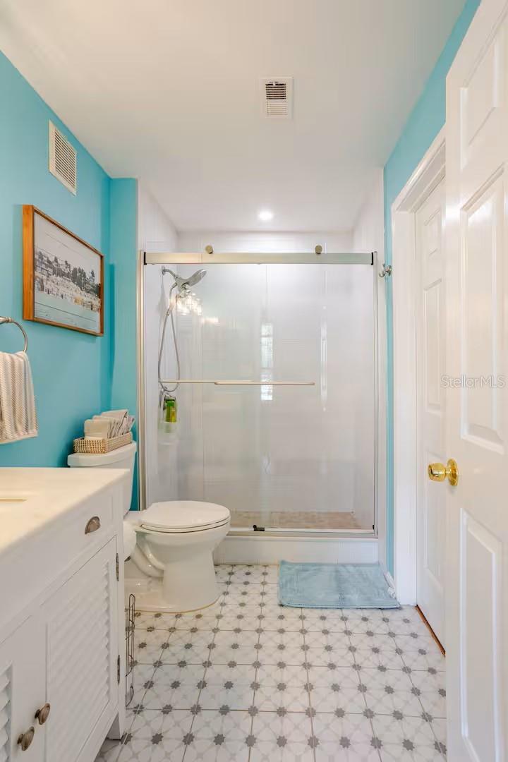 Custom tile work throughout bathroom.