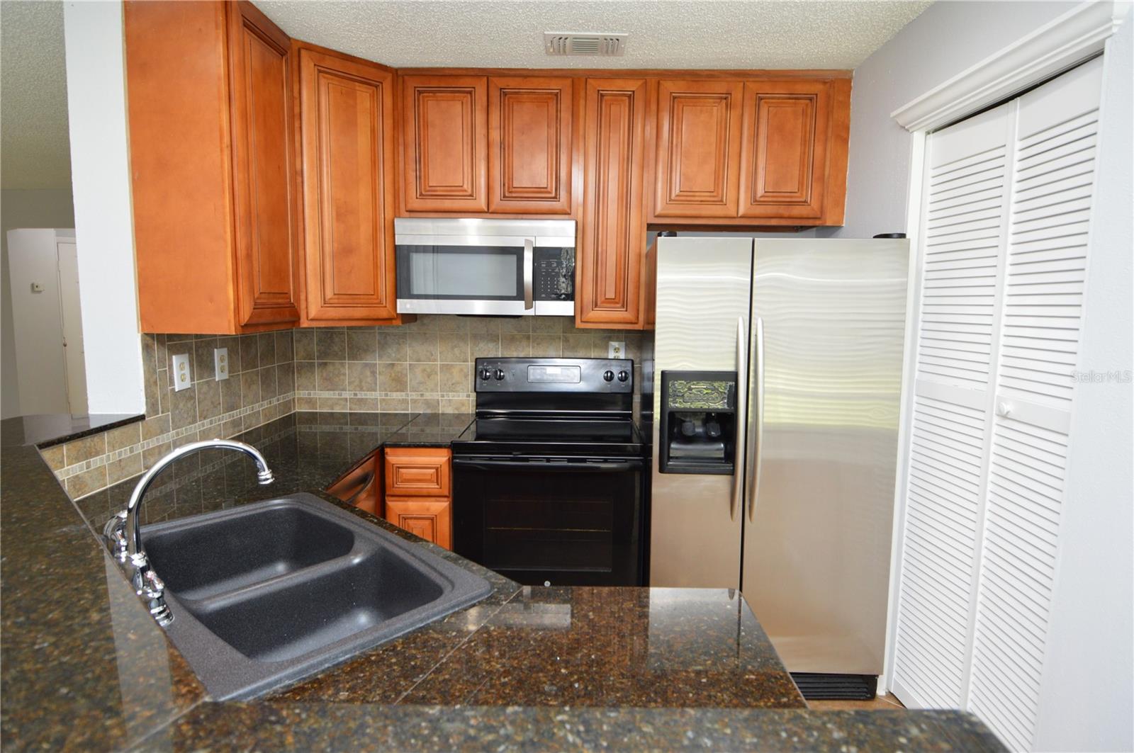 8613 MALLARD RESERVE DR #102, TAMPA, FL, 33614