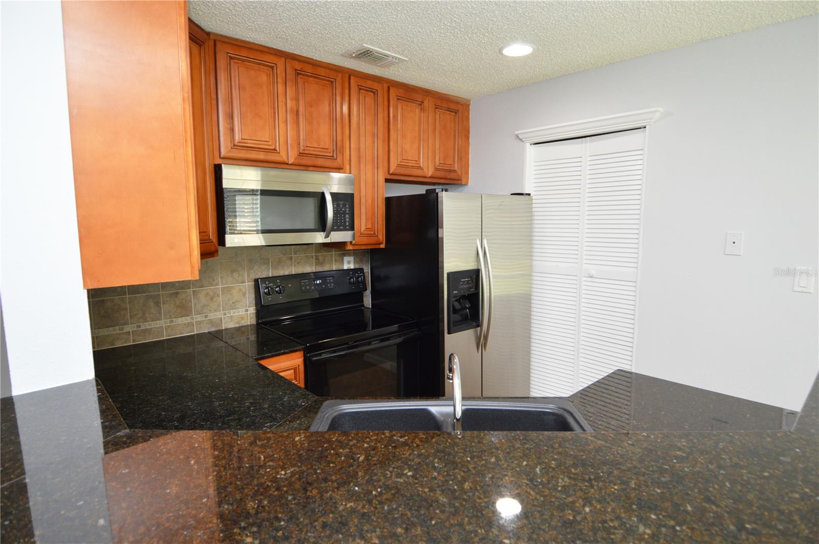 8613 MALLARD RESERVE DR #102, TAMPA, FL, 33614