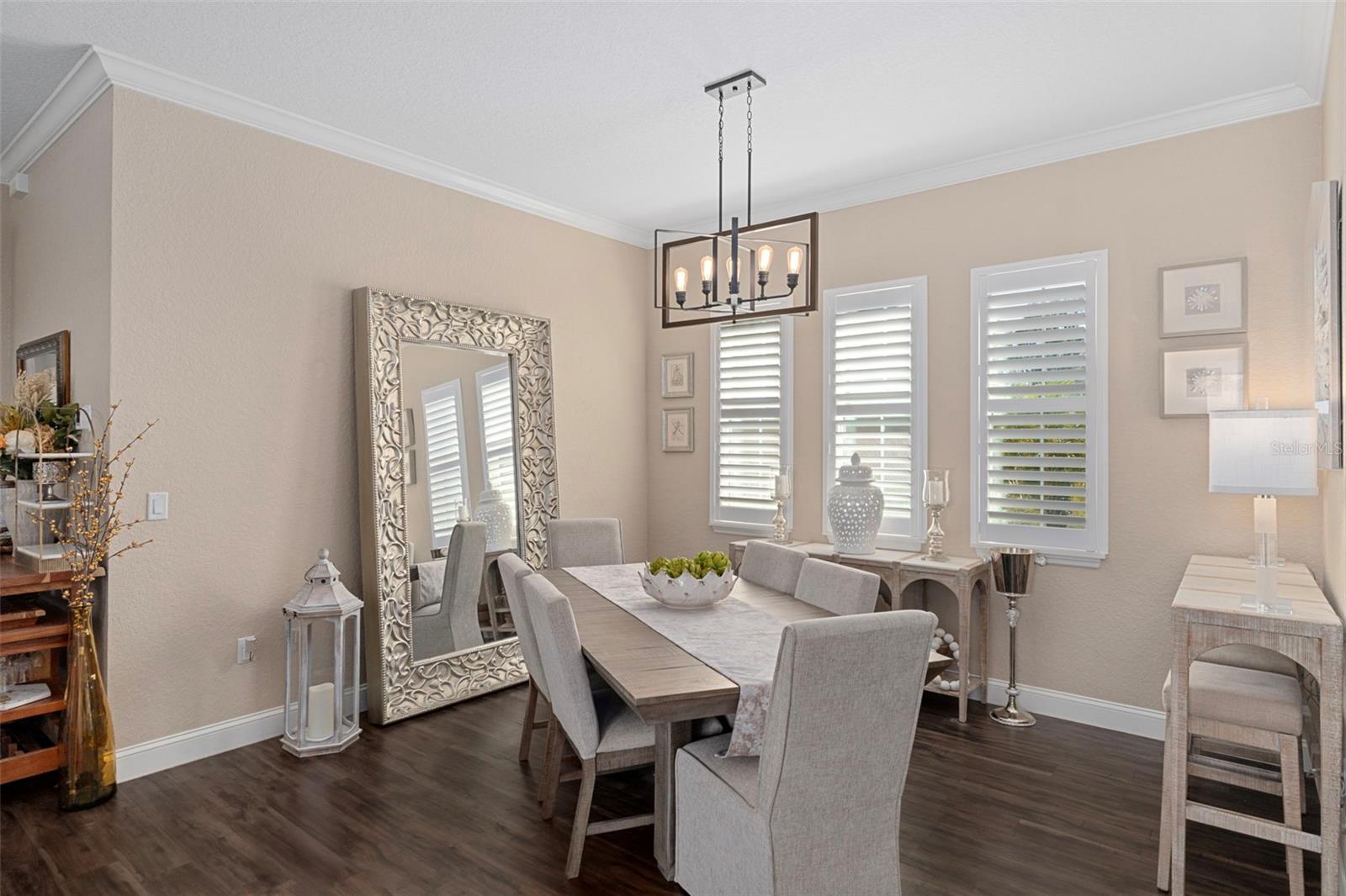 Bright dining room with plantation shutters