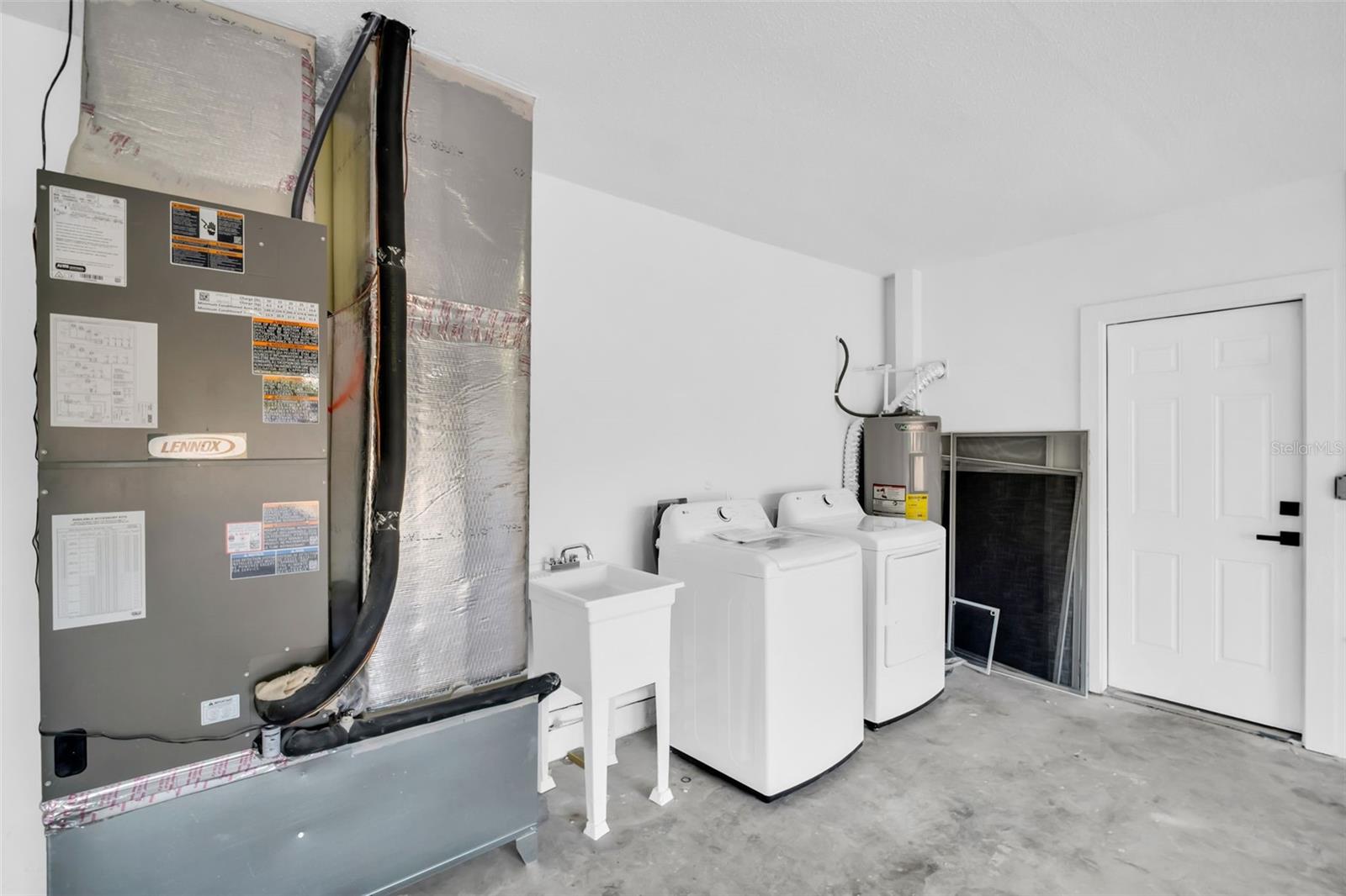 OVERSIZED TWO CAR GARAGE WITH LAUNDRY