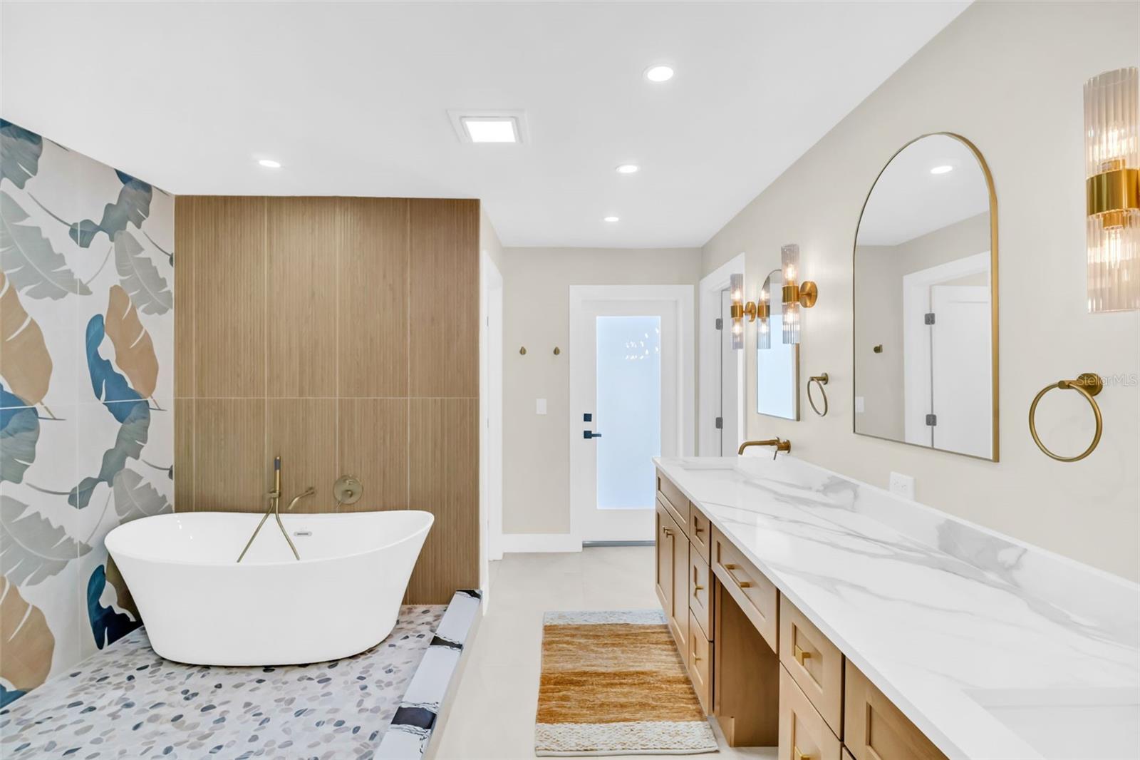 PRIMARY EN SUITE WITH CUSTOM BATH AND WALK IN CLOSET