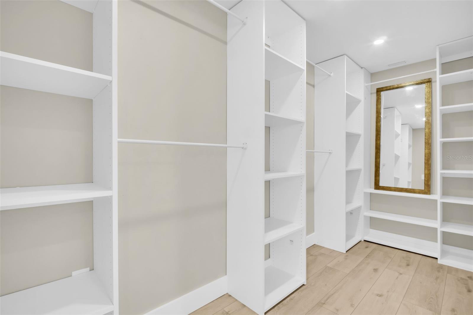 PRIMARY EN SUITE WITH CUSTOM BATH AND WALK IN CLOSET