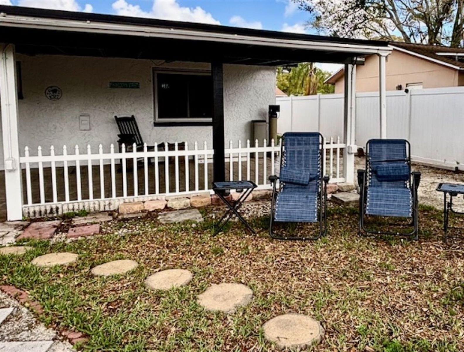 Fenced well-lit  patio