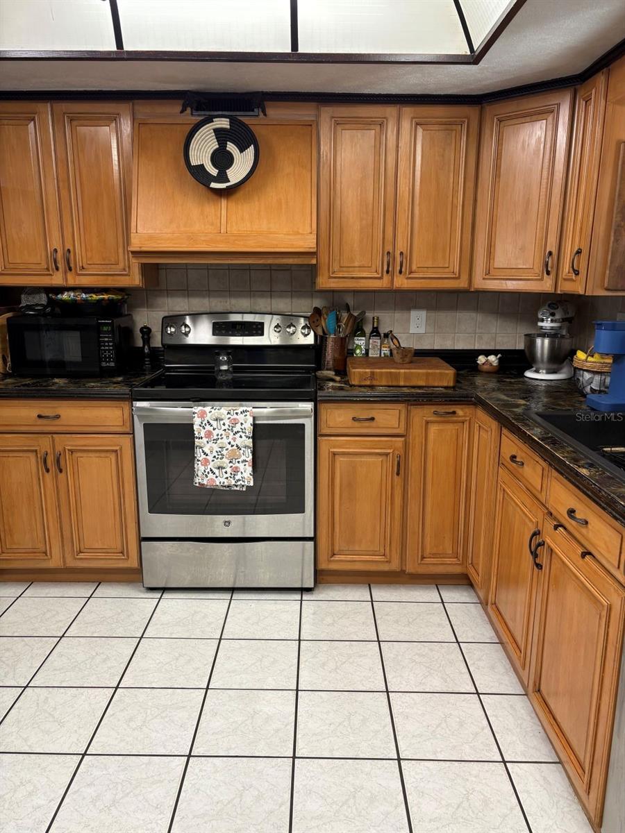 Lots of wood cabinets