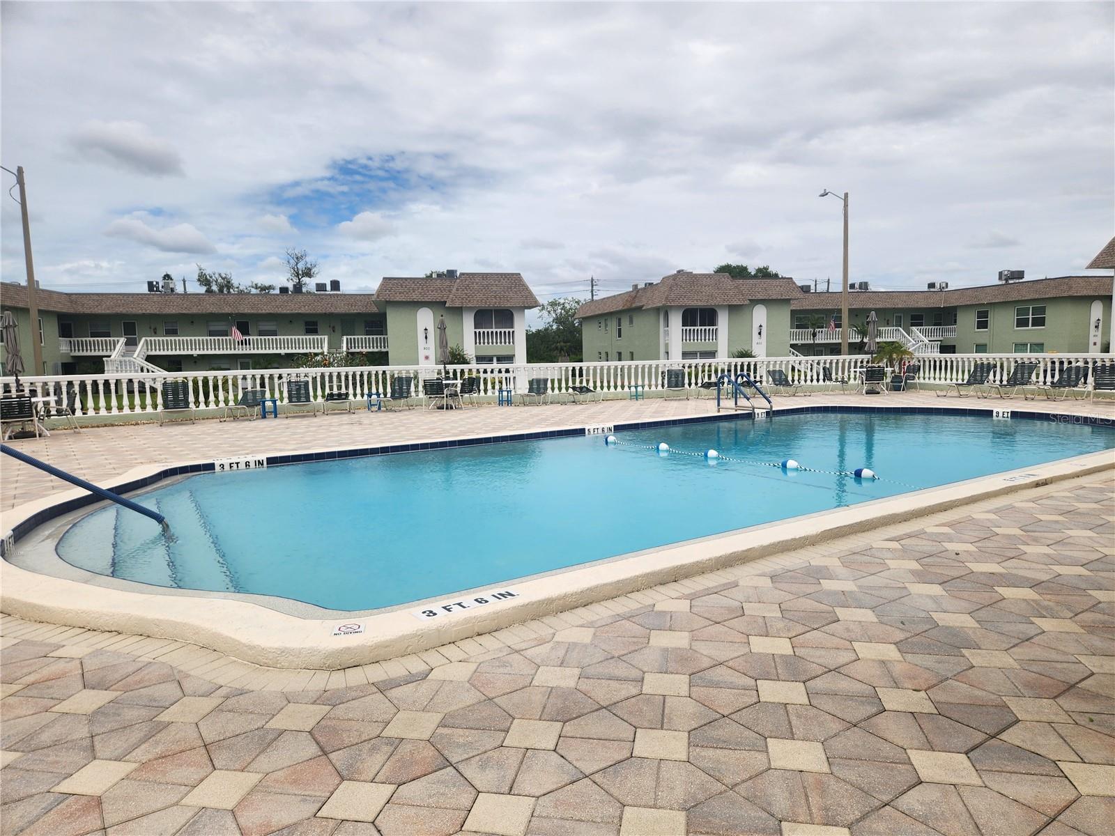 Just steps to Heated Sparkling Pond & Laundry Room