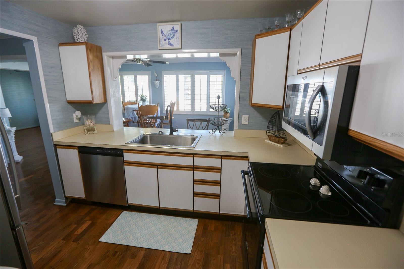 Kitchen with new Dishwasher and Microwave