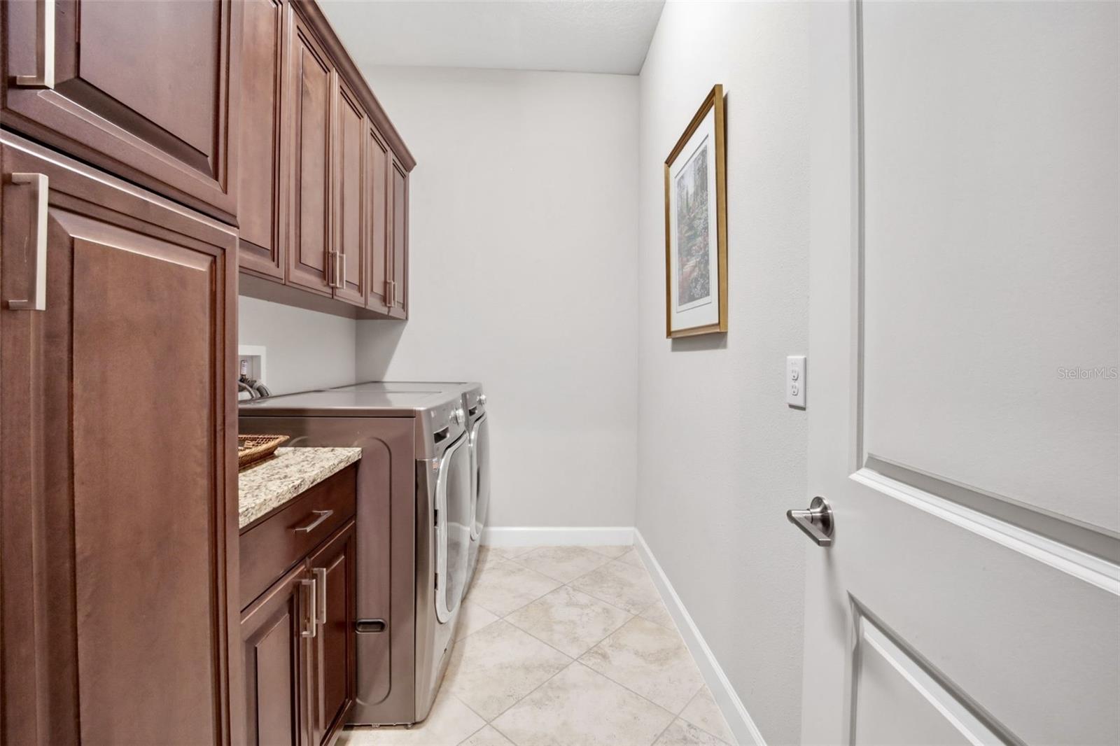 Additional custom cabinets in laundry room