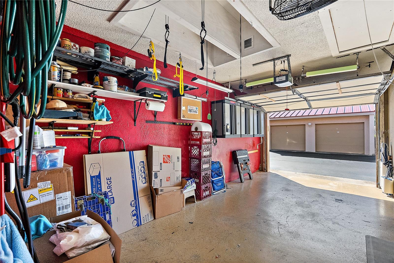 One car garage with stroage and EV charger.