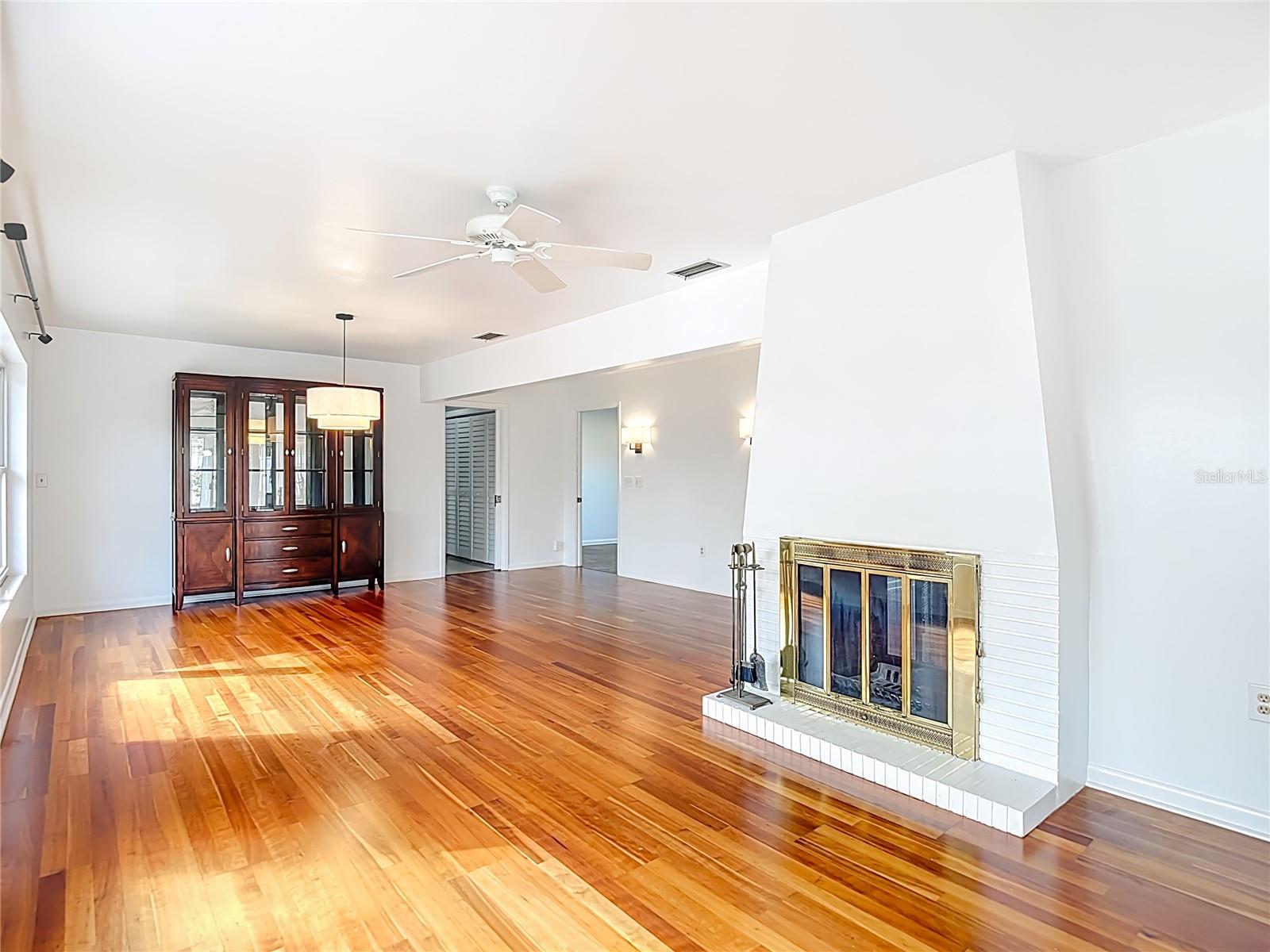 Family Room - Double Sided Fireplace - Dining Room