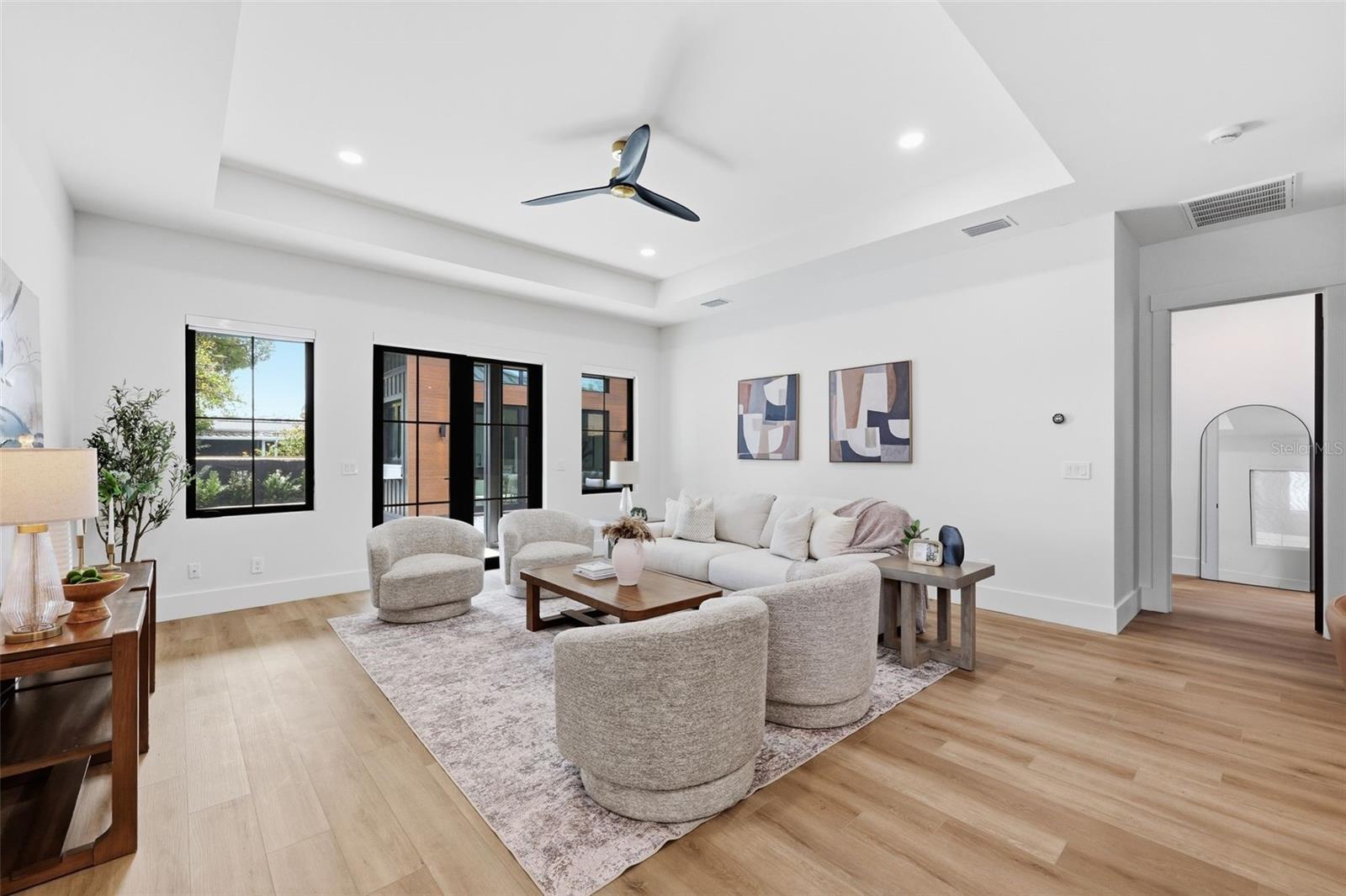 Living Room with Door to Primary